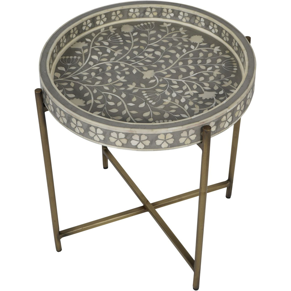 Round decorative table with floral pattern on a white background