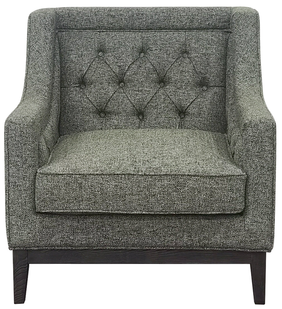 Forest green upholstered armchair with tufted backrest on a white background