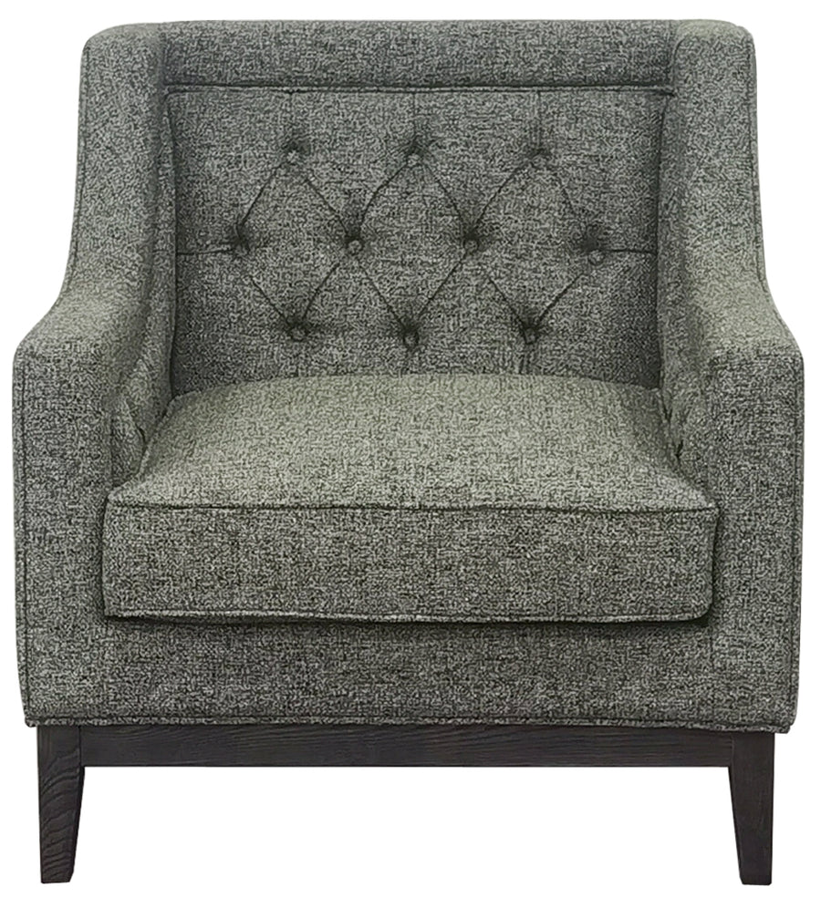 Forest green upholstered armchair with tufted backrest on a white background