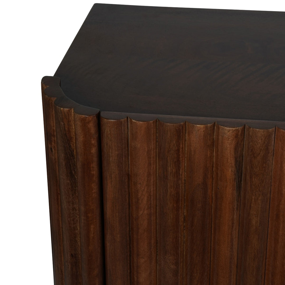 Wooden side table with a dark brown finish and ribbed design.