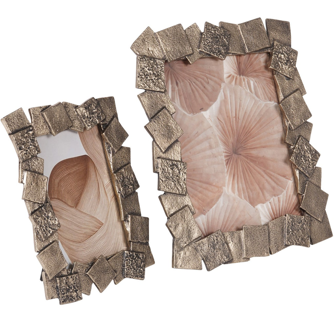 Two decorative picture frames with a textured metallic border on a white background.