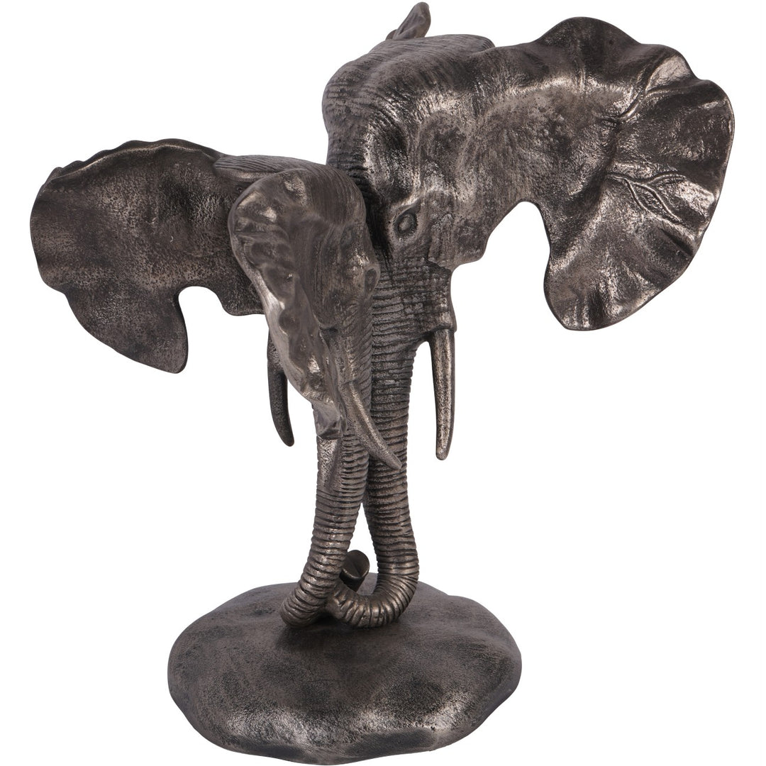 Bronze elephant sculpture on a white background