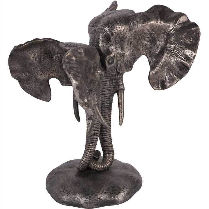 Bronze elephant sculpture on a white background