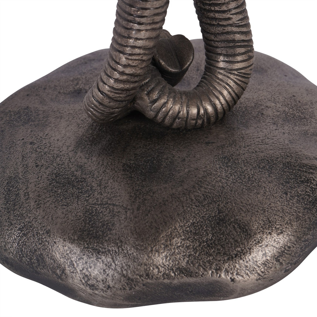 Bronze elephant statue with detailed trunk on a white background