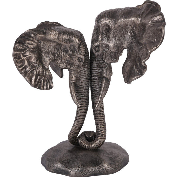 Bronze elephant sculpture with intertwined trunks on a white background