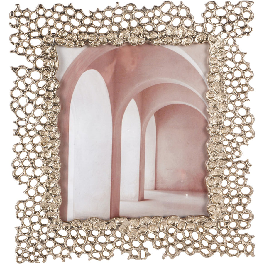 Decorative photo frame with intricate design on a white background