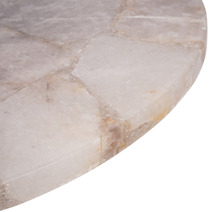 Close-up of a marble table top with beige and gray hues