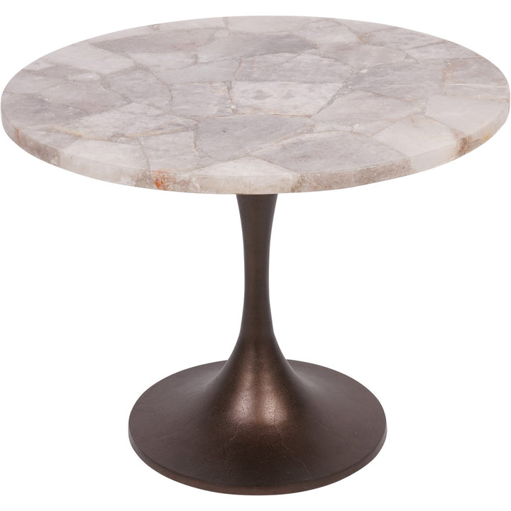 Round marble table with a bronze pedestal base on a white background