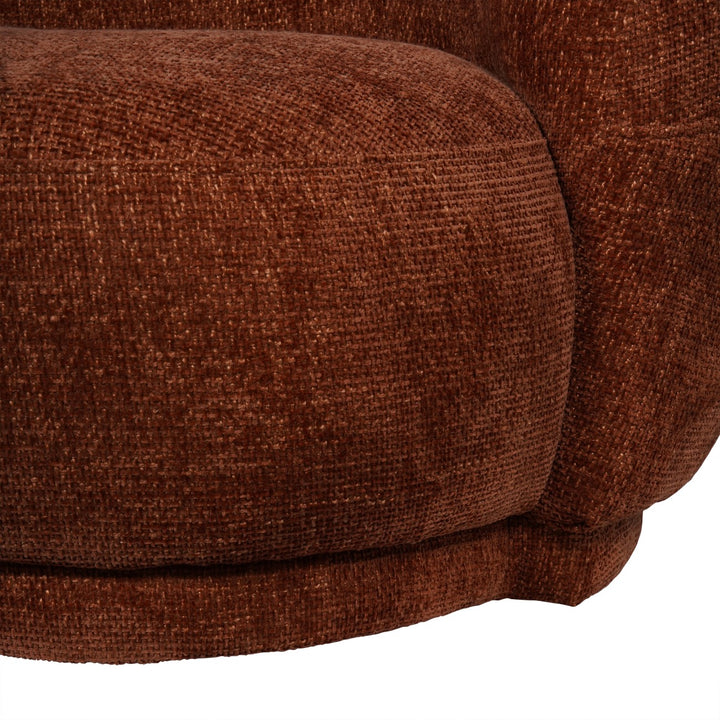 Close-up of a brown textured armchair on a white background