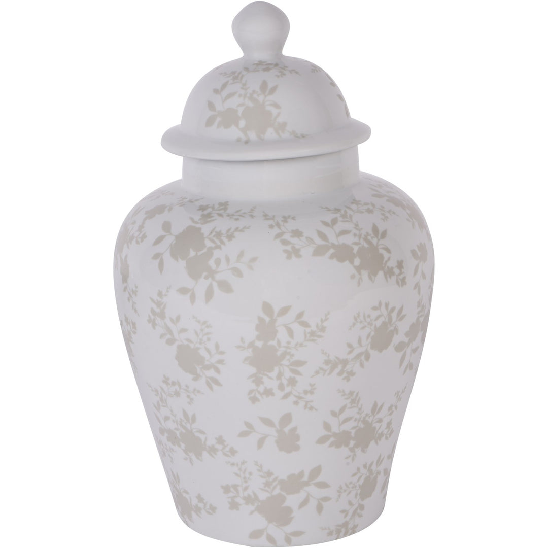 White ceramic jar with floral patterns and a lid on a white background