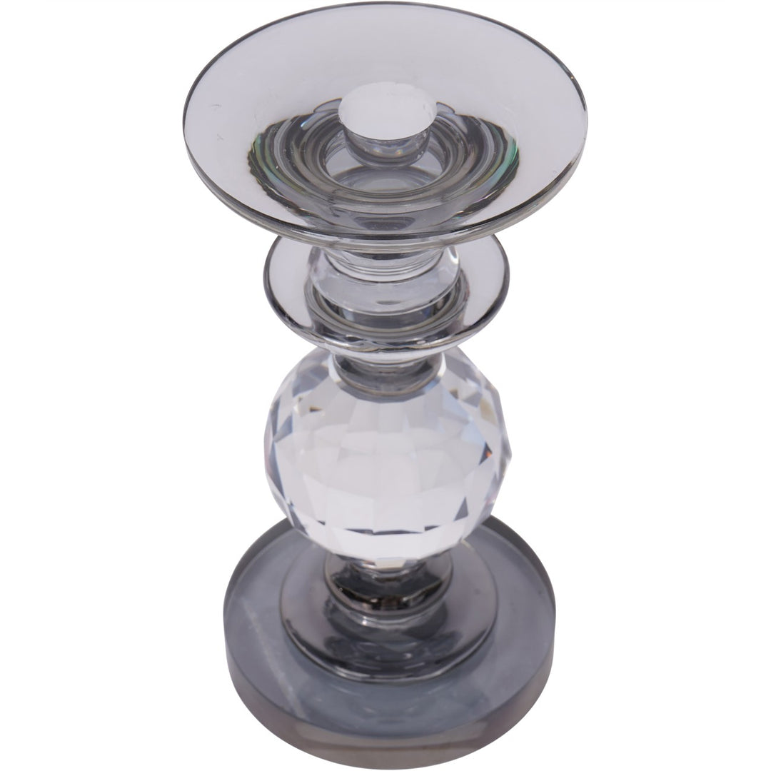 Clear glass candle holder on a white background