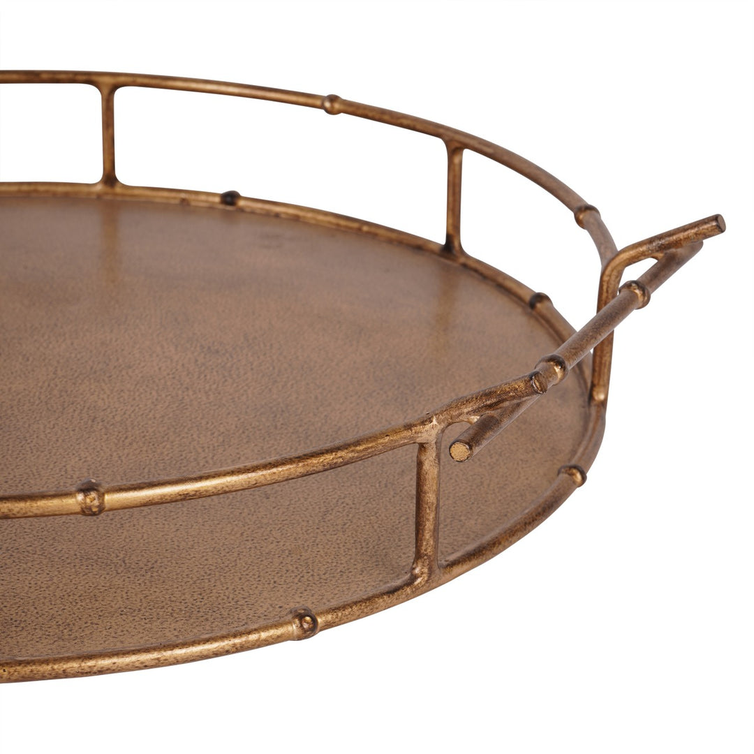 Bronze metal tray with decorative handles on a white background