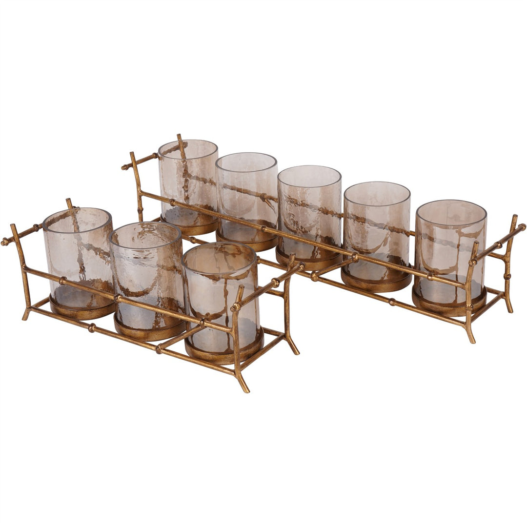 Set of glasses with a gold holder on a white background