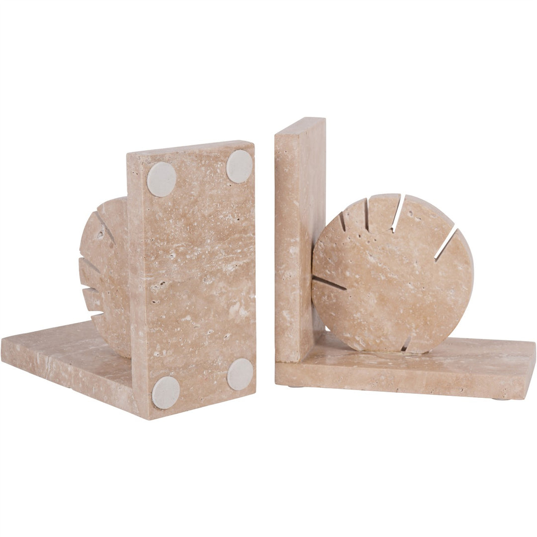 Beige marble bookends with circular designs on a white background
