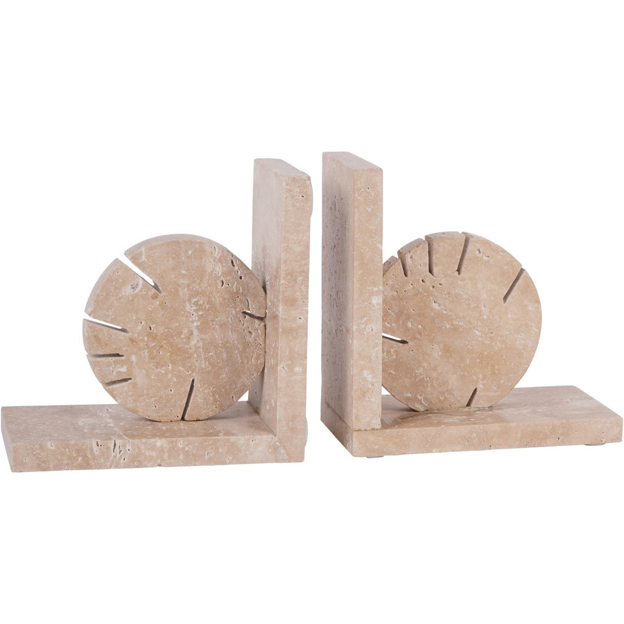 Beige stone bookends with circular designs on a white background