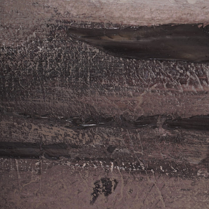 Close-up of a textured stone surface with patterns and variations in color.