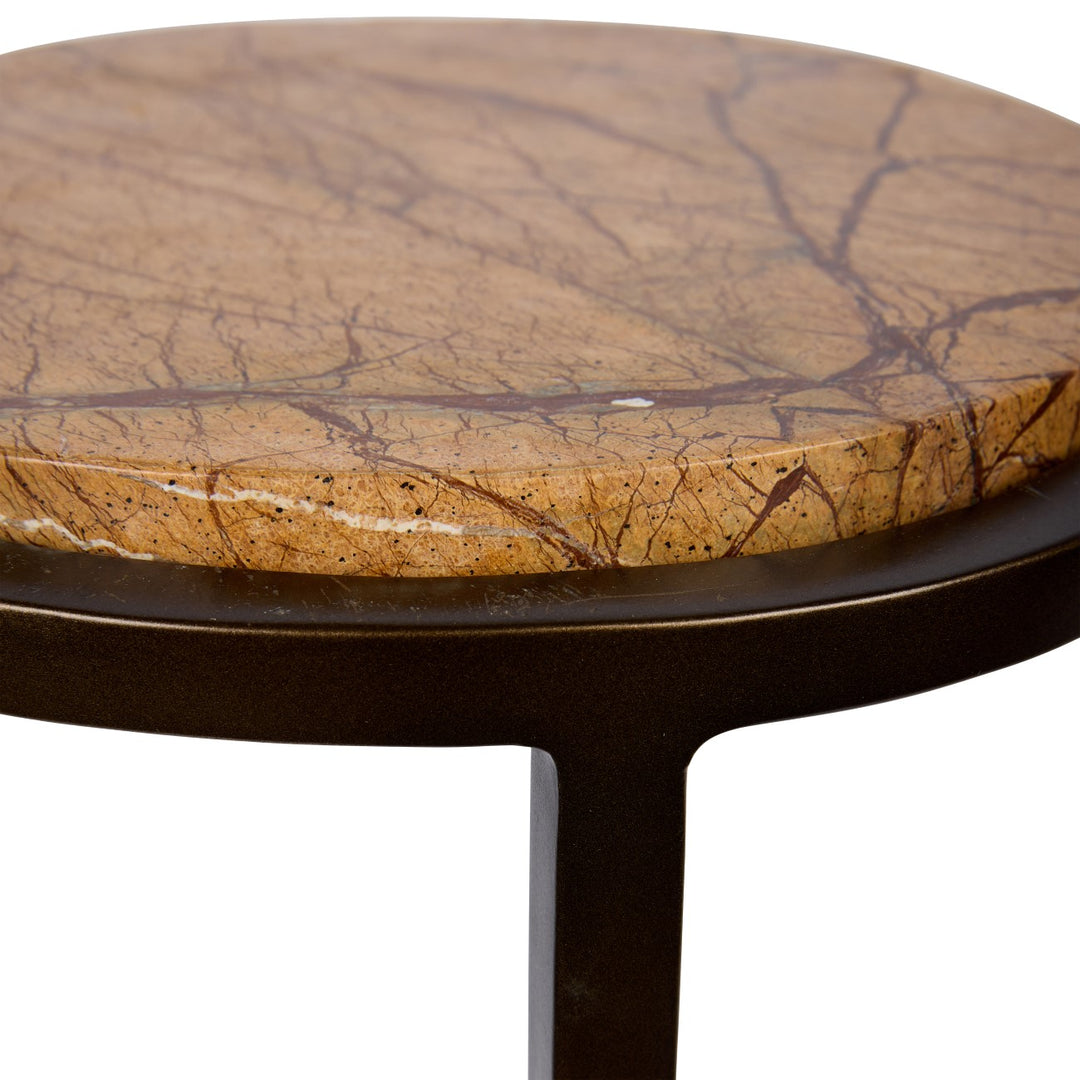 Round marble table with a brown and beige pattern on a white background