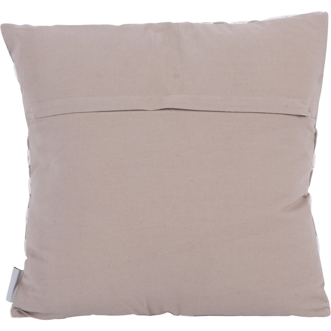 Beige pillow with a visible brand tag on a white background
