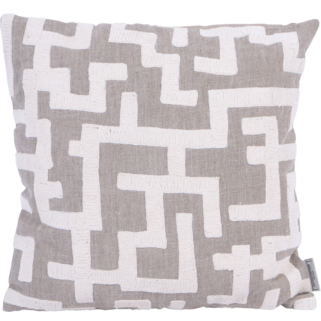 Decorative cushion with geometric pattern on a plain background