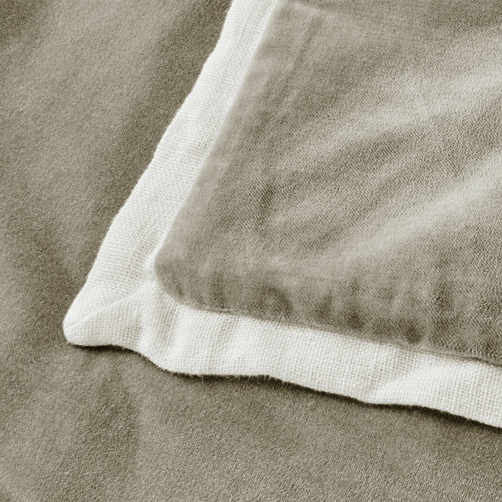 Close-up of a textured fabric surface with a focus on texture and color.