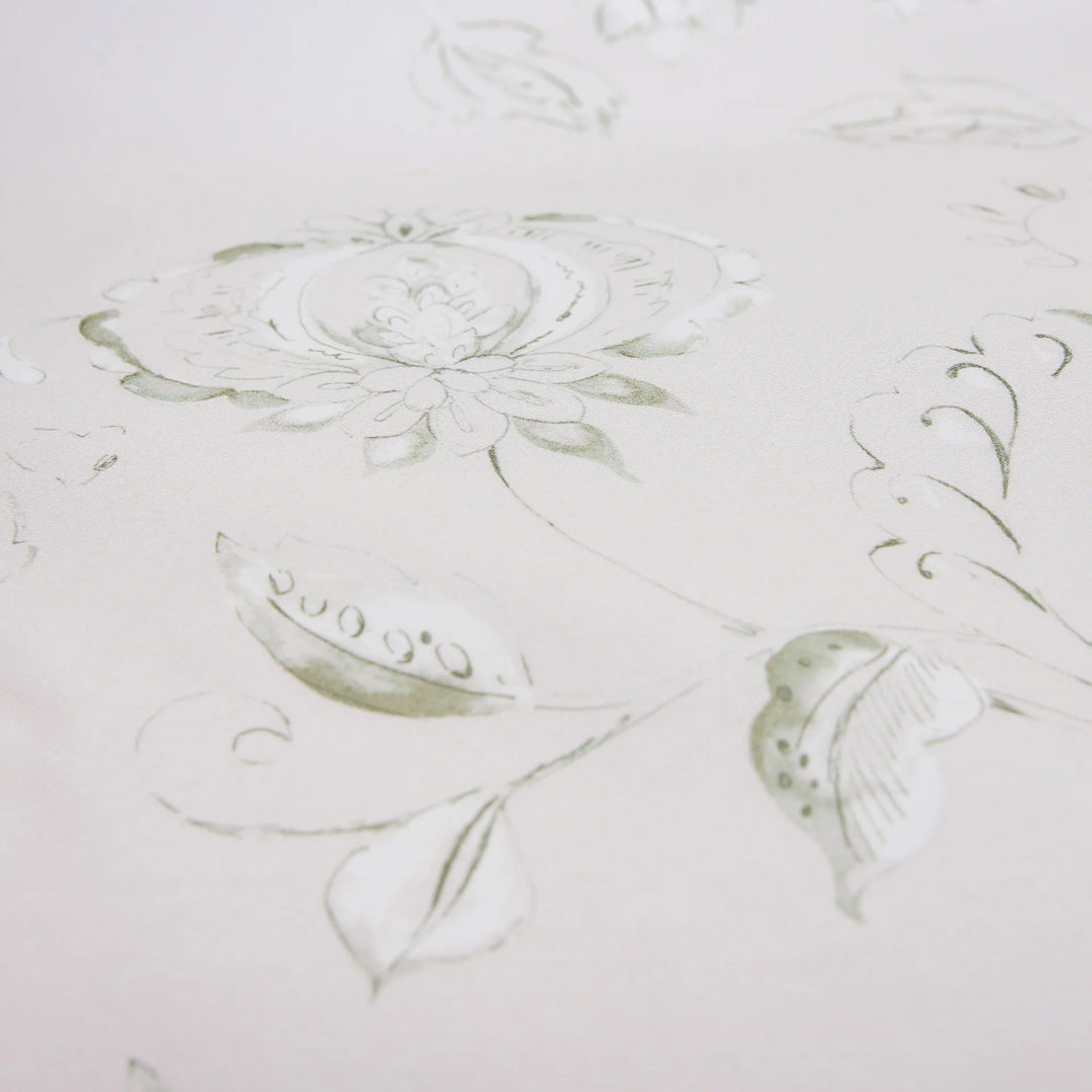 Decorative floral pattern on a textured white surface