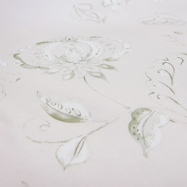 Decorative floral pattern on a textured white surface