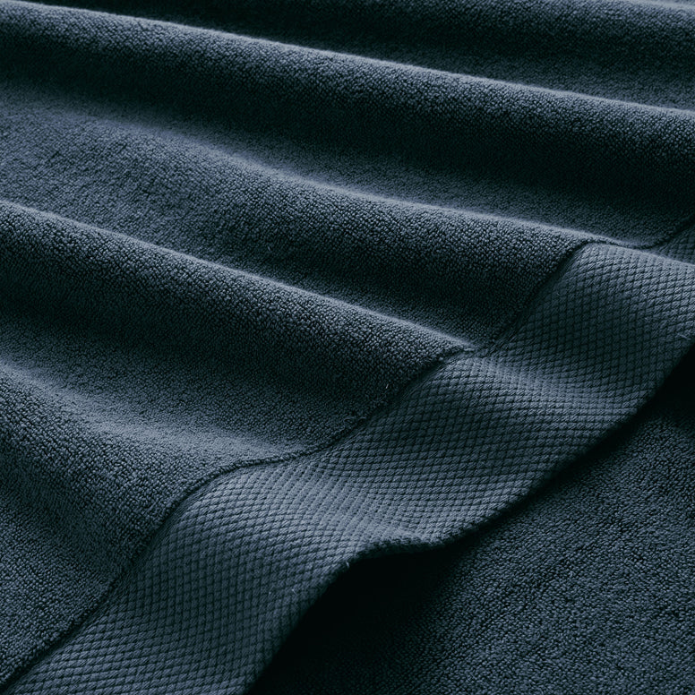 Close-up of CHRISTY Luxe - Navy Blue