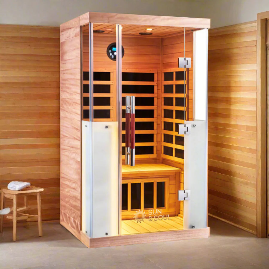 Wooden infrared sauna with open door in a room setting
